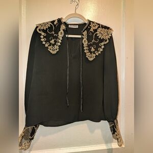 Vintage-Inspired Black Blouse with Gold Lace Collar